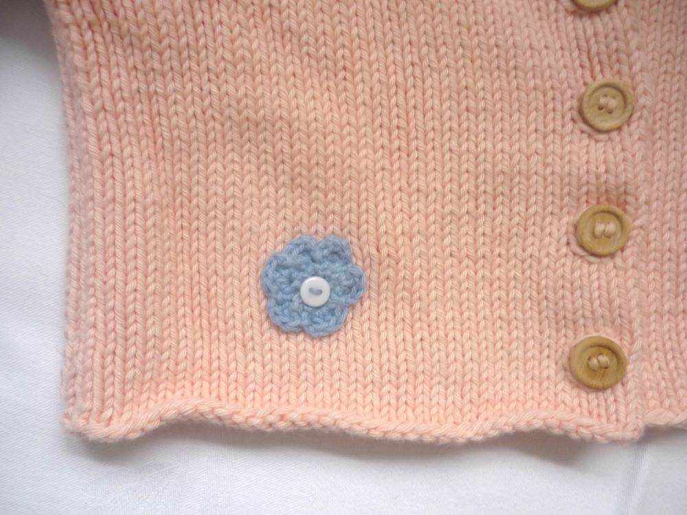 Bio Strickjacke Baby in Apricot und der Größe 80/86 - Shop Pekusch